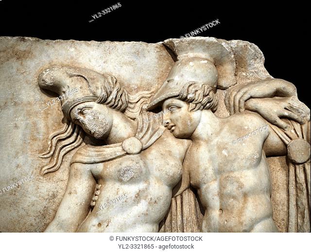Close up of a Roman Sebasteion relief sculpture of Achilles and a dying Amazon, Aphrodisias Museum, Aphrodisias, Turkey. Against a black background