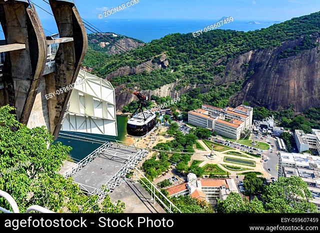 Arrival of the Sugar Loaf cable car to its first station after leaving its base on the Red beach in Urca district, Rio de Janeiro