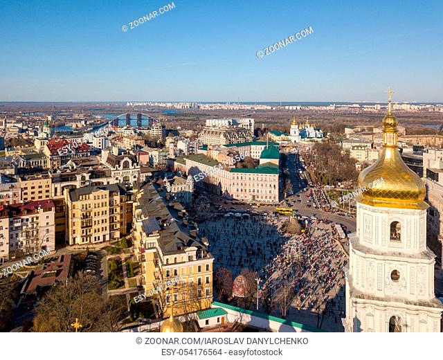 Aerial view of Saint Sophia's Cathedral tower, bridge, river Dnepro and St.Petersburg. Michaels Golden-Domed Monastery in Kiev, Ukraine. Drone photo