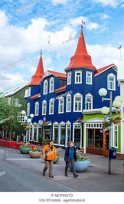 09.09.2015, Iceland Akureyri downtown center second largest city walking street Hafnarstraeti Street with blue cafe building - Island, Iceland, 09/09/2015