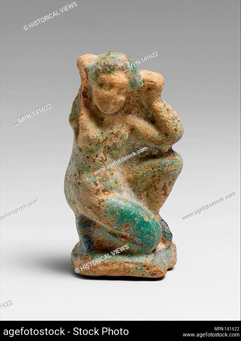 Faience statuette of Aphrodite. Period: Hellenistic; Date: 334-30 B.C; Culture: Egyptian, Ptolemaic; Medium: Faience; Dimensions: H.: 1 11/16 in. (4