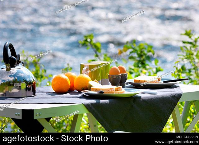Camping table by the river at an RV park