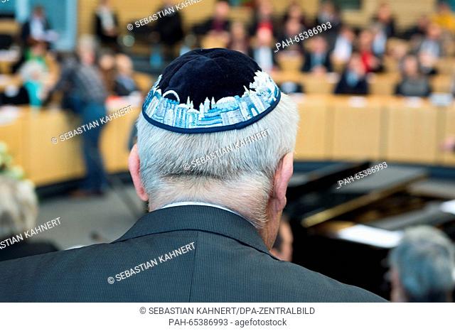 A man wearing a yarmulke attends an hour of commemoration for the victims of National Socialism in the Thuringian State Parliament in Erfurt, Germany