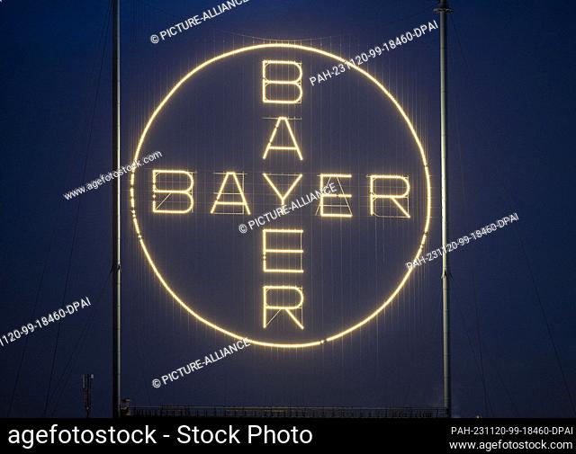 20 November 2023, NoW, Cologne: The Bayer Cross, the company's logo, shines on the Bayer site in Leverkusen. Bayer has discontinued a study with an important...