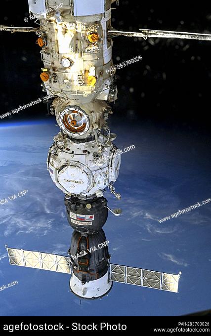 The Soyuz MS-21 crew ship is pictured docked to the Prichal docking module, which is itself docked to the Nauka multipurpose laboratory module attached to the...