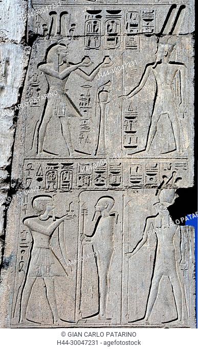 Medinet Habu, Luxor, Egypt, Djamet, mortuary temple of King Ramses III, XX dyn. 1185 -1078 B.C., : the king incense to gods Ptah and Ra Horakty and offering two...