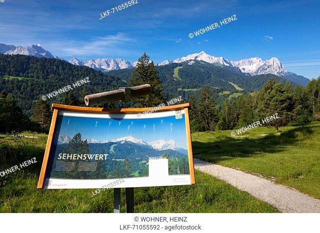 Information board in front of the Wetterstein mountain with Alpspitze, Zugspitze and Waxenstein, near Garmisch-Partenkirchen, Werdenfels region, Bavaria