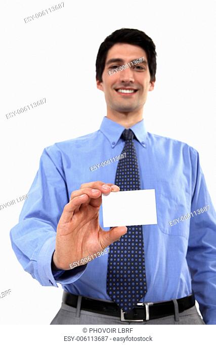 Executive holding a blank business card