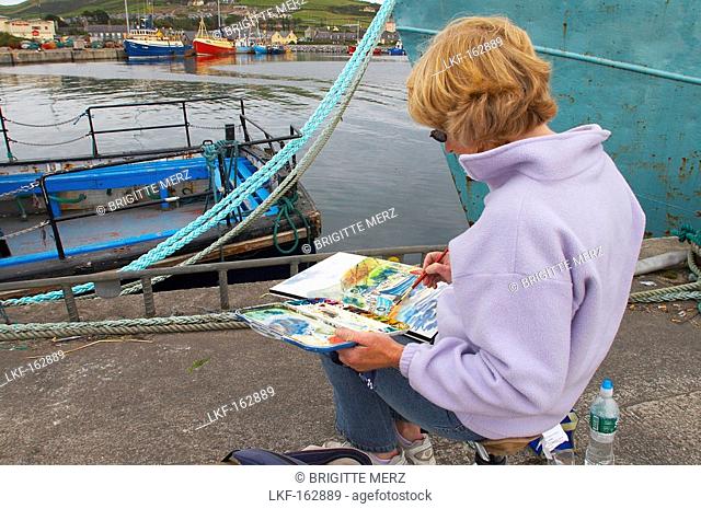outdoor photo, paintress at the harbour of Dingle, Dingle Peninsula, County Kerry, Ireland, Europe