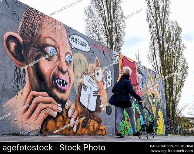 15 April 2020, Berlin: A graffito with Gollum, a character from the film ""Lord of the Rings"" and Scrat, a sabre-toothed squirrel from the film ""Ice Age""