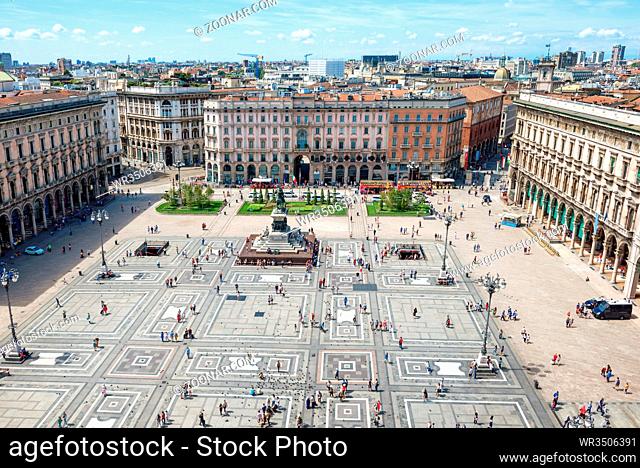 Aerial view of square from roof of famous Cathedral Duomo di Milano on piazza in Milan, Italy
