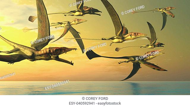 A flock of Eudimorphodon flying reptiles search for fish prey in the Triassic Era