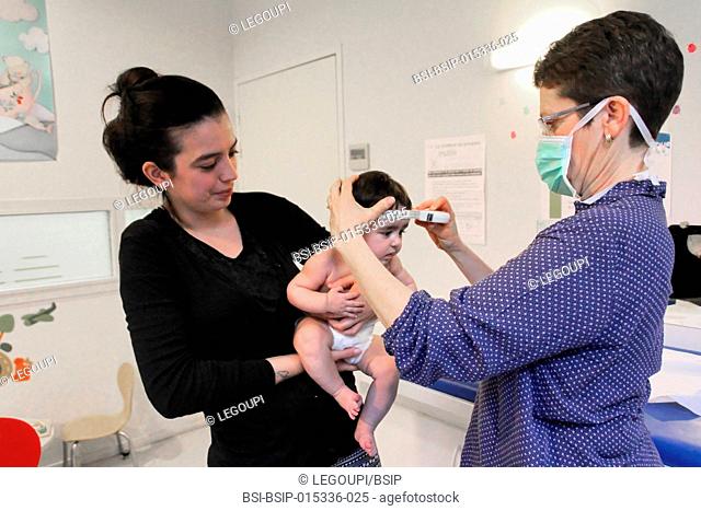 Reportage in a French Maternal and Child Protection centre in Ch?teaubriant, France. Consultation with a pediatrician. Measuring the head circumference
