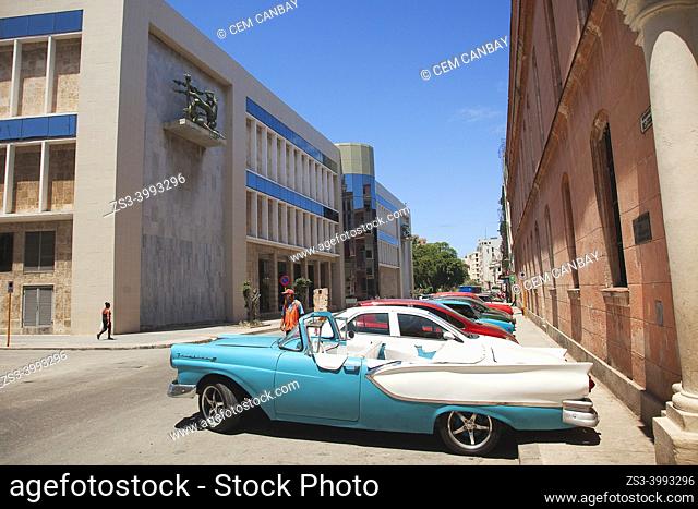 Old American car used as taxi in front of the National Museum Of Fine Arts in Old Havana-Habana Vieja, La Habana, Cuba, West Indies, Central America