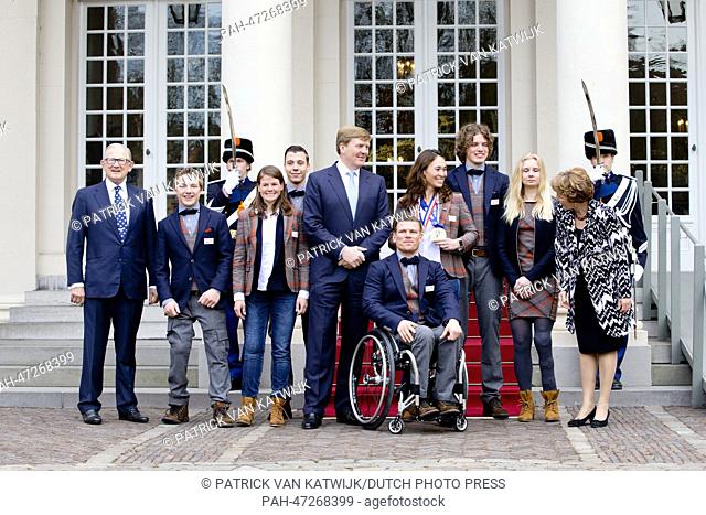 Dutch King Willem-Alexander (C), Princess Margriet (R), her husband Pieter van Vollenhoven (L) pose with Dutch participants of the Paralympic Games 2014 in...