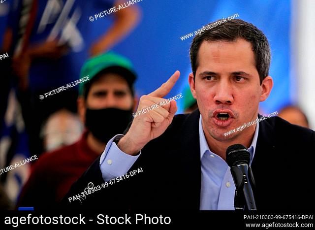 03 March 2021, Venezuela, Caracas: Juan Guaido, opposition leader, speaks at a press conference with international media