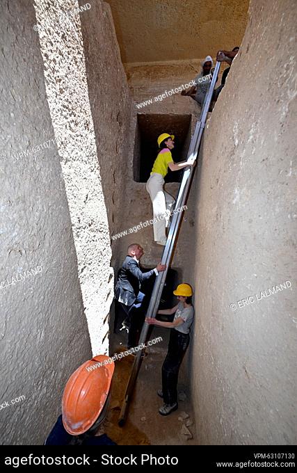 Crown Princess Elisabeth descends from a ladder during a visit to the excavation site of Dayr-al-Barsha on the third day of a royal visit to Egypt