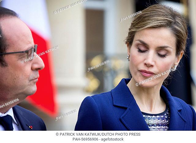 French President Francois Hollande and Spanish Queen Letizia attend a statement in front of the Elysee palace after a meeting with the French president in Paris