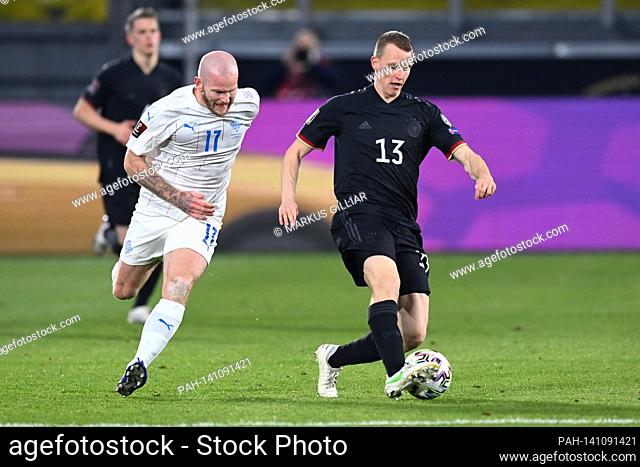 duels, duel between Aron Gunnarsson (Iceland) and Lukas Klostermann (Germany). GES / Fussball / WM-Qualifikation: Germany - Iceland, 25.03