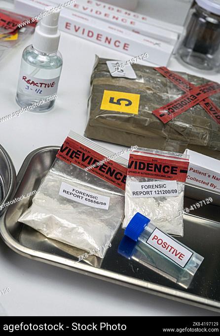 Police scientist examines seizures of adulterated fentanyl in crime lab, Conceptual Image