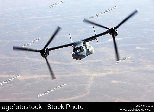 Air to air in flight view of a United States Marine Corps MV-22 Osprey during a combat operation over the Helmand Province, Afghanistan