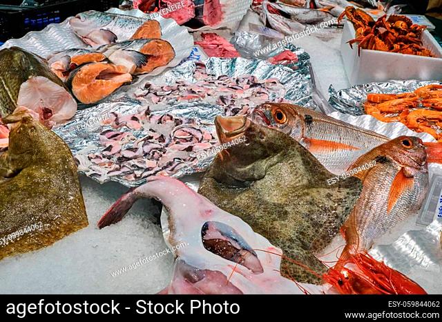 Fresh seafood and fish for sale at a market stall