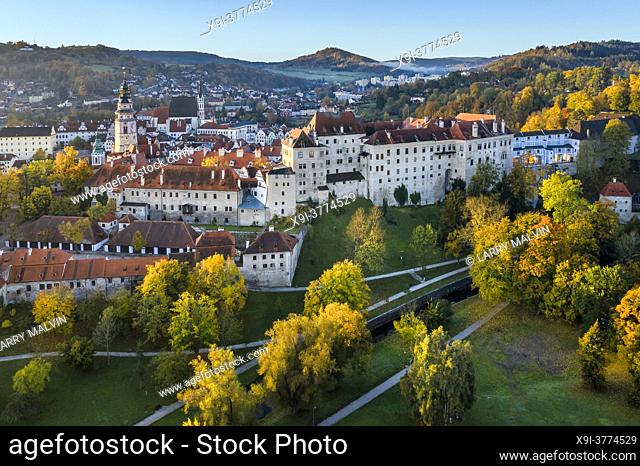 Aerial view just after sunrise of the castle in the picturesque, fairy tale town of Cesky Krumlov, a UNESCO-designated World Heritage Site in the South Bohemia...