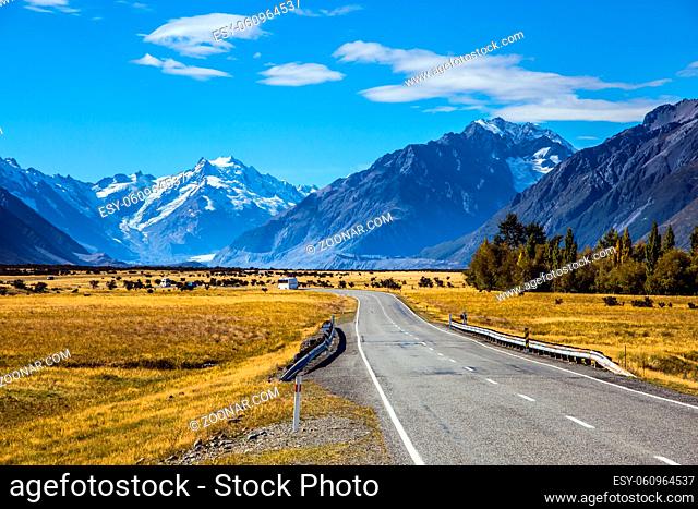 New Zealand. Mount Cook National Park. Magnificent highway goes through the valley in the high snow-capped mountains. The concept of active