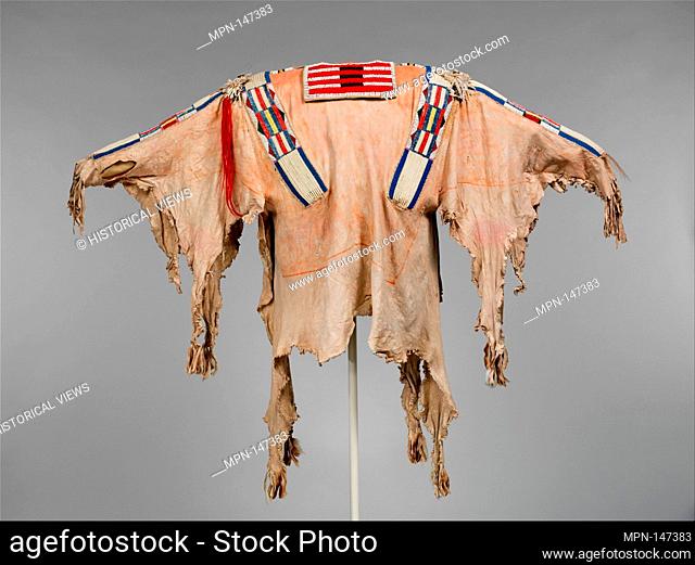 Man's Shirt. Date: ca. 1860; Geography: United States, Wyoming or Montana; Culture: Crow; Medium: Native-tanned skin, factory-woven cloth, porcupine quill