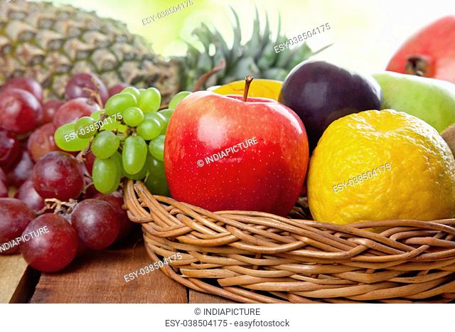 Wicker basket filled with fresh fruits