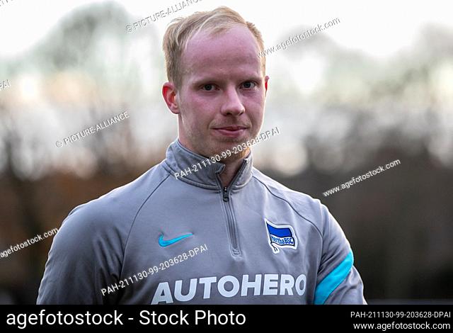 30 November 2021, Berlin: Berlin's Dennis Jastrzembski smiles during Hertha BSC's first training session after taking over from coach Korkut