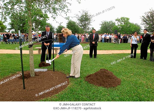 Gen. Jefferson D. Howell Jr., JSC Director, and Evelyn Husband, wife of Columbia Commander Rick Husband, participate in tree planting ceremonies as other...