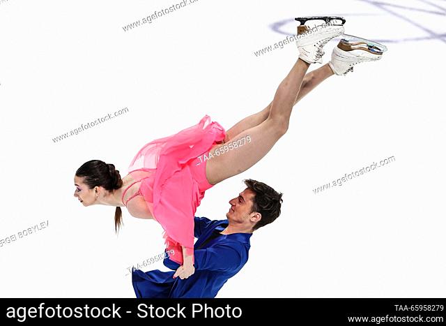 RUSSIA, CHELYABINSK - DECEMBER 21, 2023: Ice dancers Alexandra Prokopets and Alexander Vaskovich perform their rhythm dance during the ice dance event of the...