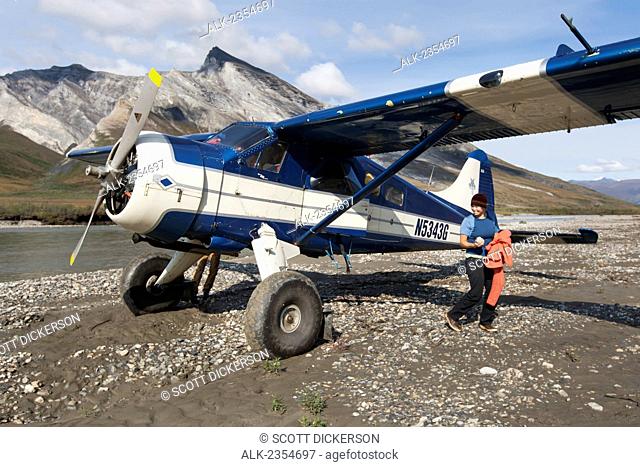 Bushplane arriving at the Noatak River, Brooks Range, Arctic Alaska; Alaska, United States of America