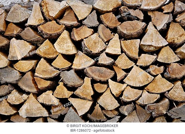 Stacked pile of firewood, detail