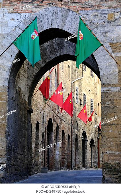 Lane Via San Matteo flags San Gimignano Tuscany Italy