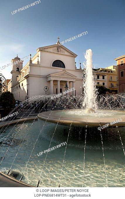 The Fountain in the Piazza Pia and the Chiesa dei Santi Pio e Antonio church at Anzio in Italy