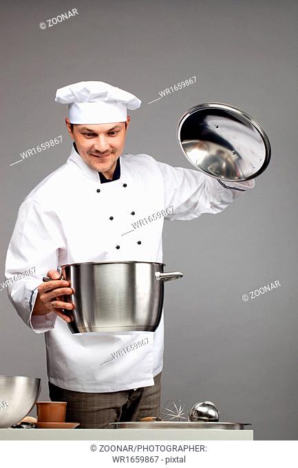 Chef cooking with pot