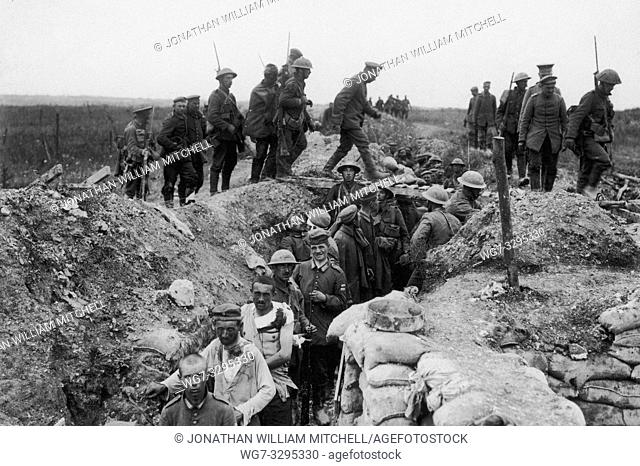 FRANCE The Somme -- 1916 -- British Army soldiers with German Army PoWs during the Battle of the Somme in France during World War I -- Picture by Atlas Photo...