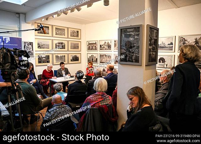 16 December 2023, Bremen: Masha Gessen (back, center l), publicist from the USA, sits at the presentation of the Hannah Arendt Prize in event room F61