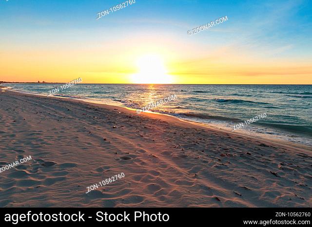 Spectacular sunset on the famous Varadero sand beach in Cuba