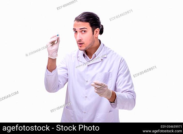The young handsome doctor with syringe isolated on white