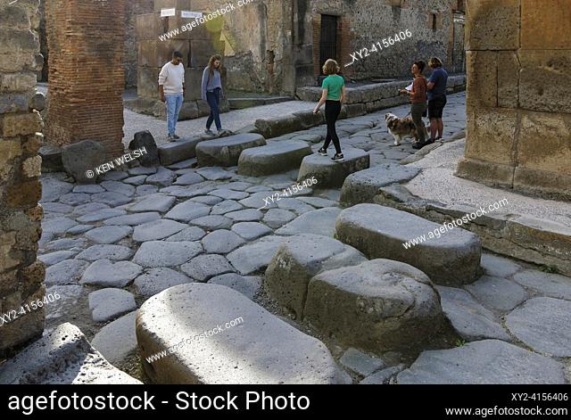Pompeii Archaeological Site, Campania, Italy. Stepping stones across street. Pompeii, Herculaneum, and Torre Annunziata are collectively designated a UNESCO...