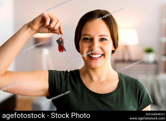 Happy New House Real Estate Owner Holding Keys