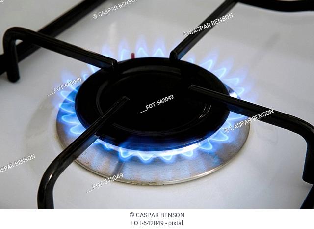 A blue flame from a gas oven
