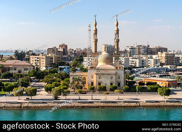 Suez, Egypt - An Egyptian Mosque and maritime port at the city of Tawfiq (Suburb of Suez), Eqypt on the southern end of the Suez Canal before exiting into the...