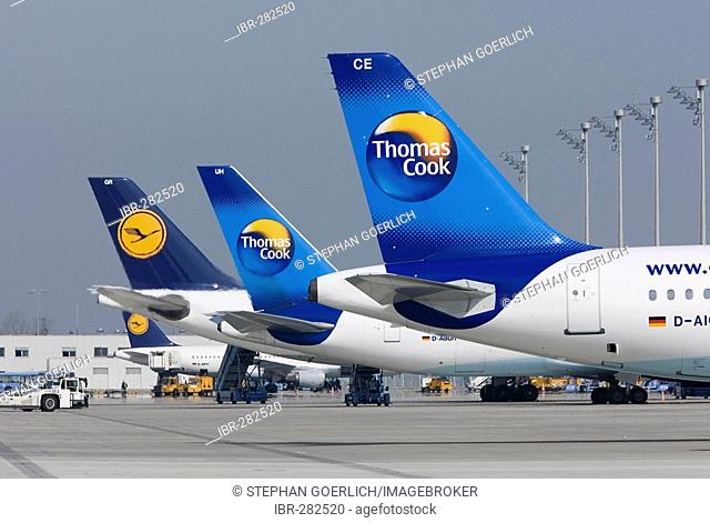 Aircrafts of Thomas Cook and Lufthansa at Munich Airport, Bavaria, Germany