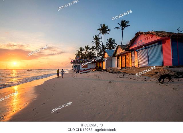 Beach huts at sunrise, Bavaro Beach, Bavaro, Higuey, Punta Cana, Dominican Republic, West Indies, Caribbean, Central America