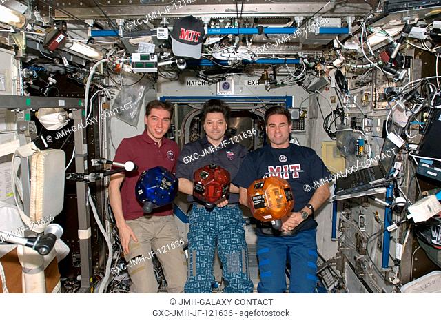 Russian Federal Space Agency cosmonauts Sergei Volkov (left), Expedition 17 commander; Oleg Kononenko (center) and NASA astronaut Greg Chamitoff