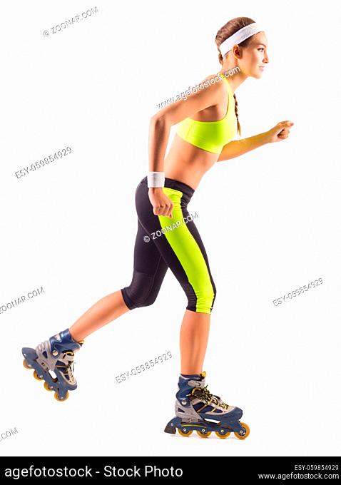 Roller skating young girl isolated